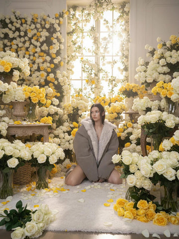 Reversible oversized hooded winter coat for women, gray padded bomber jacket side with white faux fur lining visible